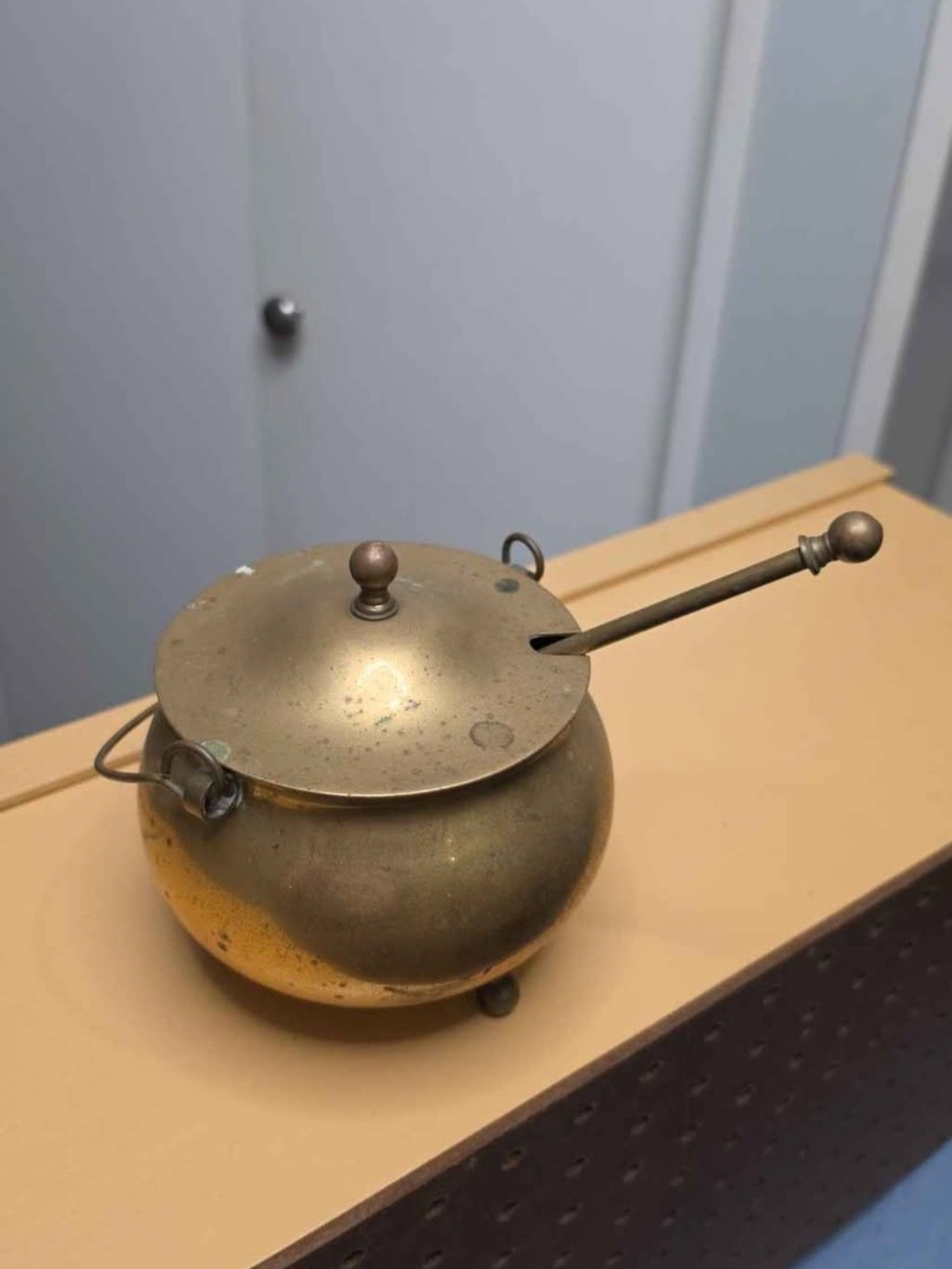 Vintage Brass fire starter with pumice stone wand.